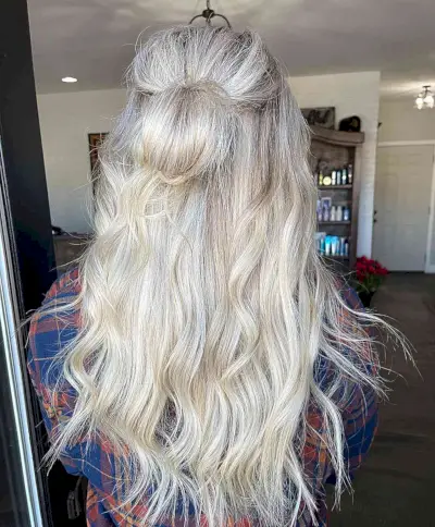 long blonde half up bun hairdo