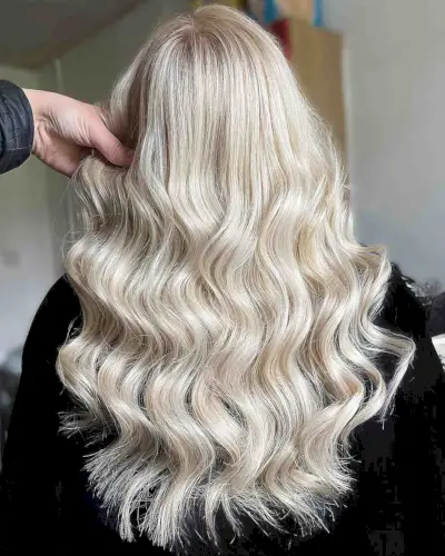 light blonde icing balayage on longer hair