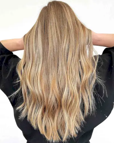 bright and dimensional sandy blonde with long hair