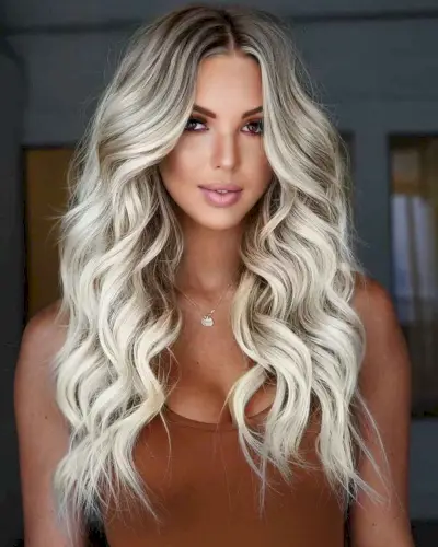face-framing long blonde layered hairstyle