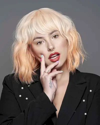 Mid-length bob with side-swept bangs