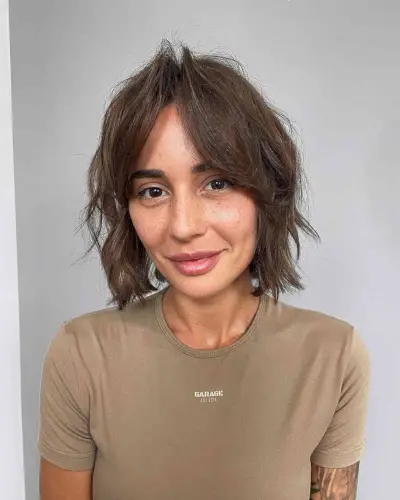 Choppy Neck-Length Bob with Curtain Bangs