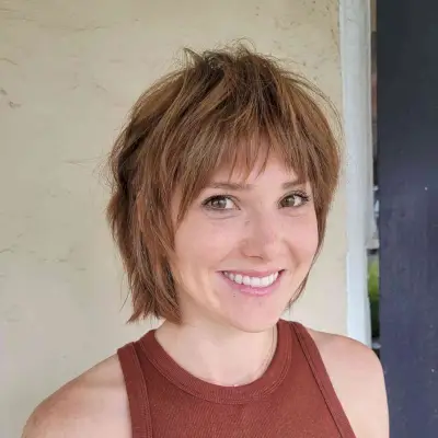Neck-Length Shaggy Bob with Textured Bangs