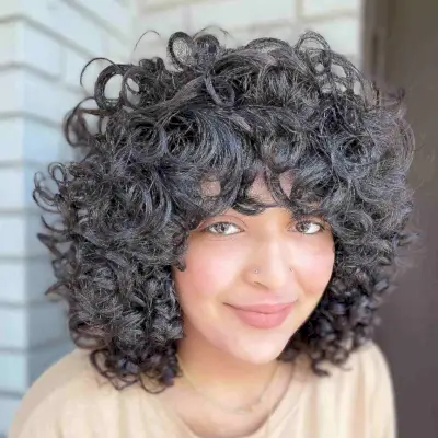 Short Fluffy Thick Curls and Fringe