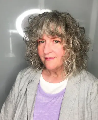 Curly Bob with Bangs for Over 50 with Thin Hair