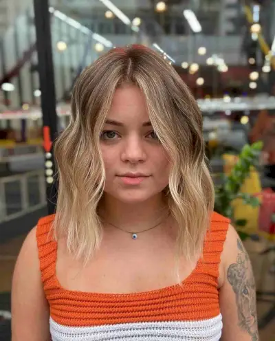 Low-Maintenance Blunt Textured Lob for Round Faces