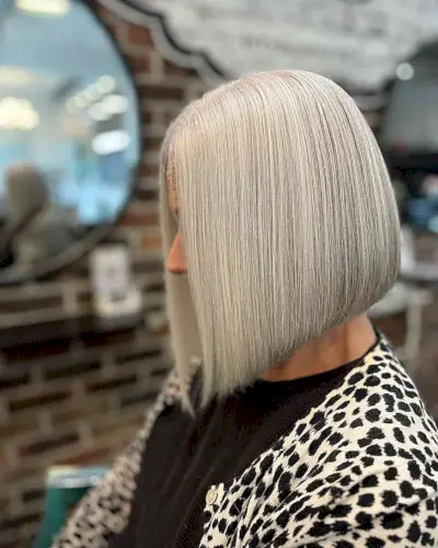 Angled Bob with Light Grey Balayage for older women with short straight hair