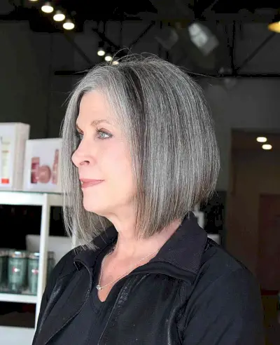 Crisp Angled Bob with Natural Color for older women embracing their aging hair