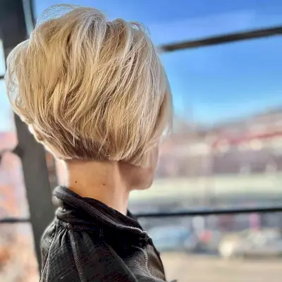 Sharp A-Line Bob with a Messy back and slight taper with stacking