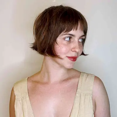 Razor-Cut Tiny Bob with choppy bangs