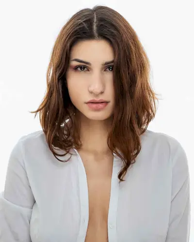 Medium-Length razor cut bob with a Middle Part