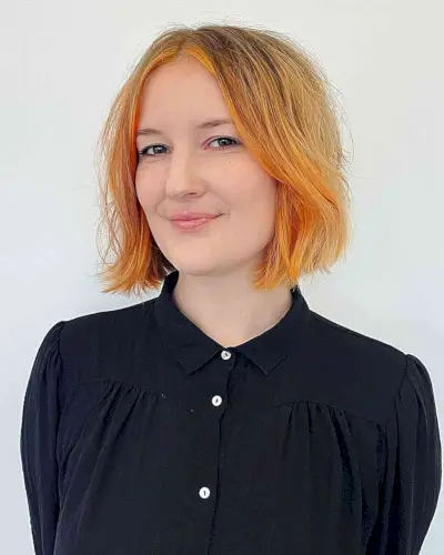 Center-Parted Orange Blonde Short Bob with Razor Cut Layers