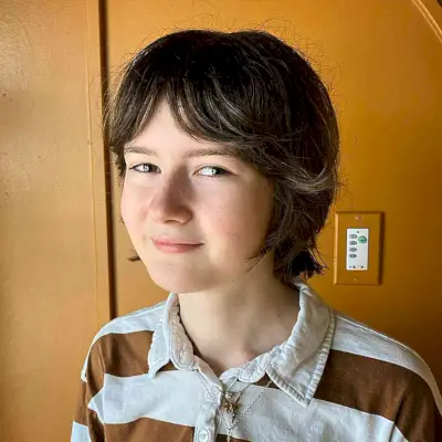 Bixie Mullet with Middle-Parted Bangs and Razor Cut Layers