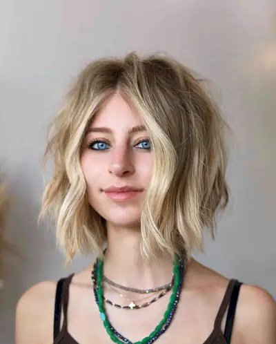 Cool Textured Bob with Blonde Highlights for girls with straight hair