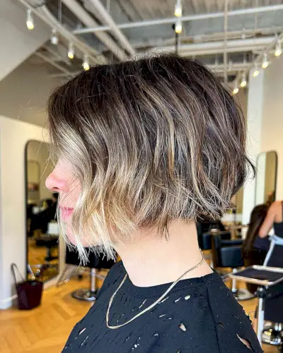 Chin-Length Mini Brown Textured Bob with Face-Framing Highlights