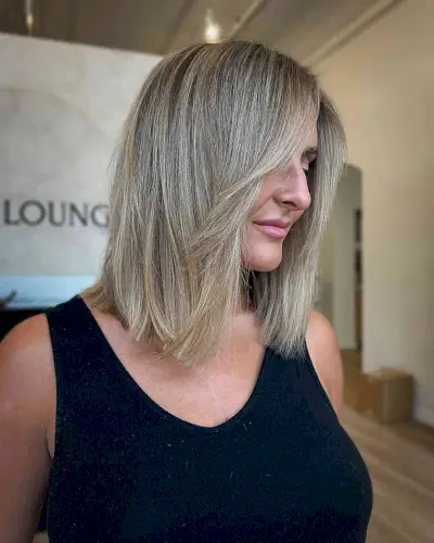 Collarbone-Skimming 1990s Lob with Face Frame