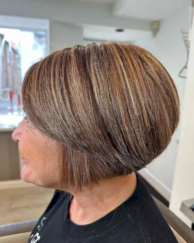 Very Short Graduated Bob with Side-Swept Bangs and Highlights