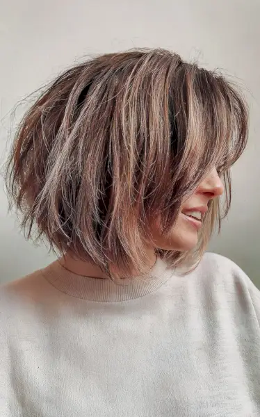 Layered bob with long bangs hairstyle
