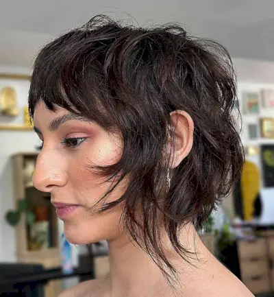 Shaggy Bixie Cut with Razored Layers and Short Bangs
