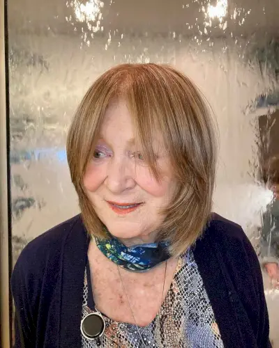 Romantic Shoulder-Length Layered Bob for Older Women