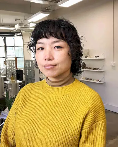 Cold Perm and Bangs on Neck-length Wolf Bob Cut