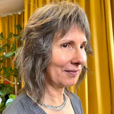 Shoulder-Length Wolf Cut Bob Shag with Choppy Bangs