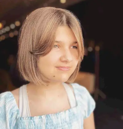 Classy Short Middle-Parted Bob Cut and a Curtain Fringe