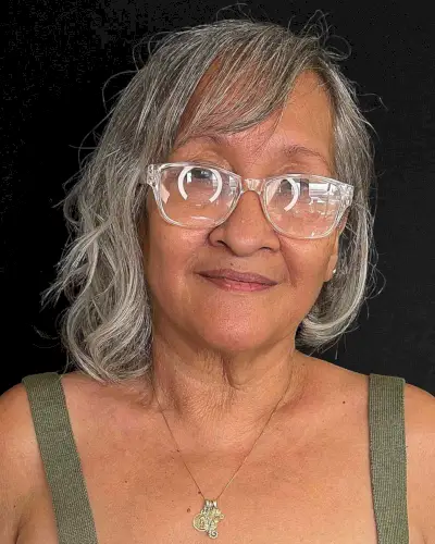 Short Asymmetric Bob Cut with Side Bangs for Older Ladies