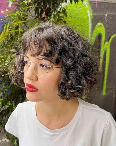 Chin-Length Curly Bob with Wavy Bangs
