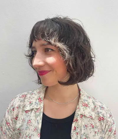 Chin-Grazing Layered Shaggy Bob with Short Bangs