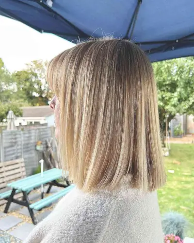 Shoulder-Length Blonde Box Bob with Fringe
