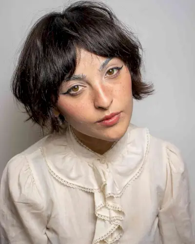 Low-Maintenance Messy Bob with Curtain Bangs