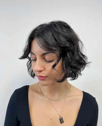 Wispy French Bob Hairstyle with Curled curtain bangs for Fine Hair