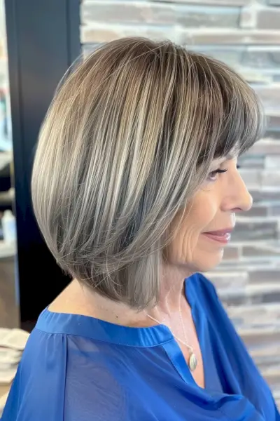 Long stacked bob haircut for women over 50