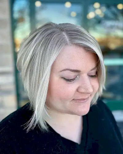 Deep Side Part Bob and Icy Blonde Color for Fine-Haired Women with Round Faces
