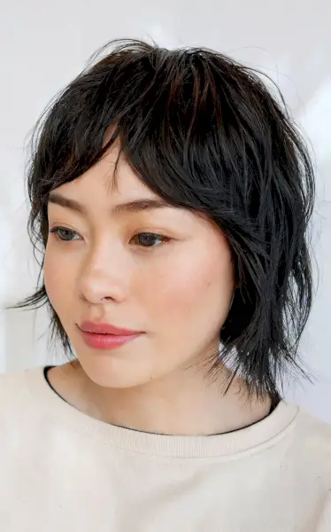 Shaggy Jagged Bob with Wispy Layers and Fringe