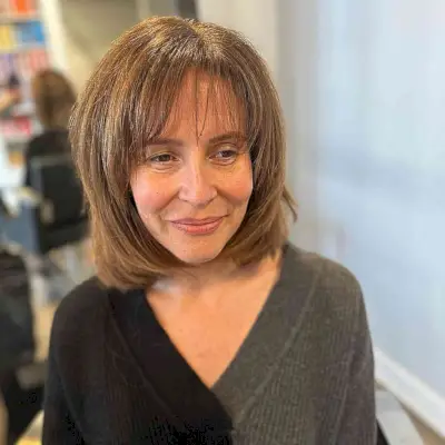 Long Textured Bob with Thin Bangs and layers for older women with thin hair