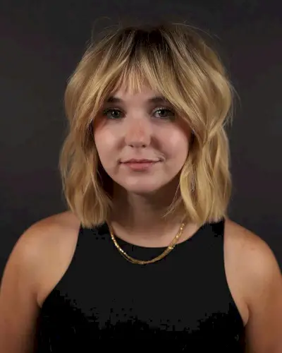 Shoulder-Length Blonde Lob with Choppy Short Fringe