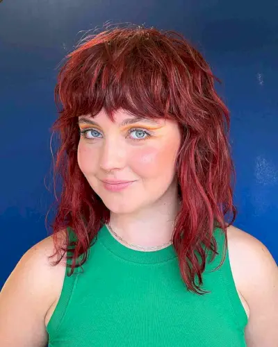 Edgy Choppy Layered Long Bob with Straight Bangs