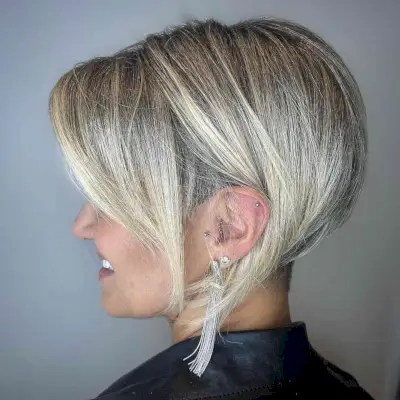 Undercut Blonde Pixie Bob Hair with Dark Roots