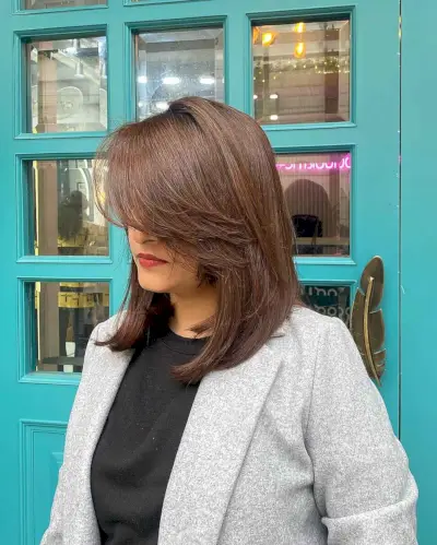Angled Lob Haircut with Long Layered Bangs