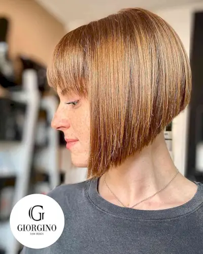 A-Line Bob Cut with Bangs and a Shaved Nape for women with light colored hair