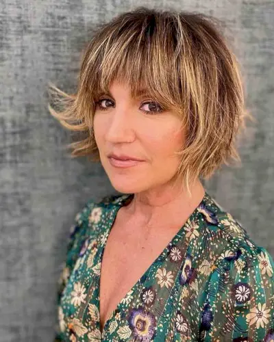Blonde Balayage Choppy Bobbed Hair with Bangs