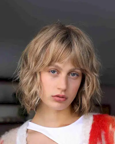 Shaggy Bob with Bangs and Natural Curls for Thin Hair