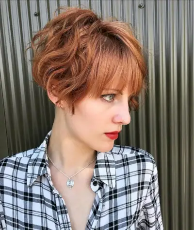 Stacked bob with bangs for wavy hair