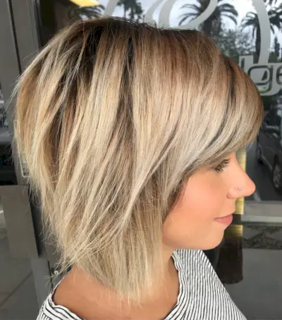 Medium-Length Stacked Bob Cut with Bangs