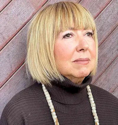 Short-Length Straight Bob with Jagged Ends and Bangs on Older Women with Round Faces