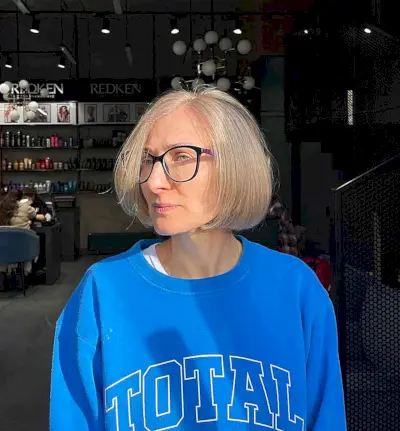Low-Maintenance Short Round Bubble Bob for Older Women with Glasses
