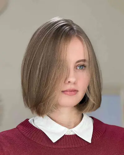 Neck-Length Bubble Blunt Bob with Off Center Part