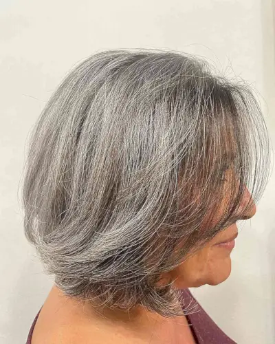 Medium Gray Butterfly Bob with Long Fringe on Older Ladies